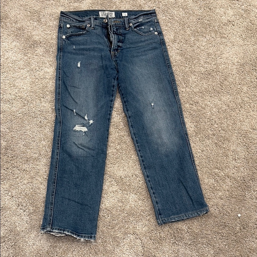 Distressed Blue Jeans